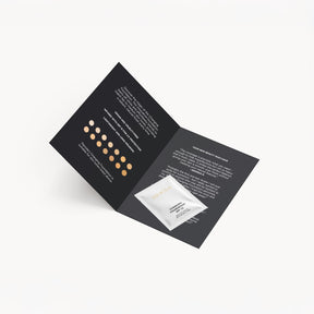Changing Foundation Sample 1.5 ml sachet on a black leaflet featuring shade swatches and customer reviews.