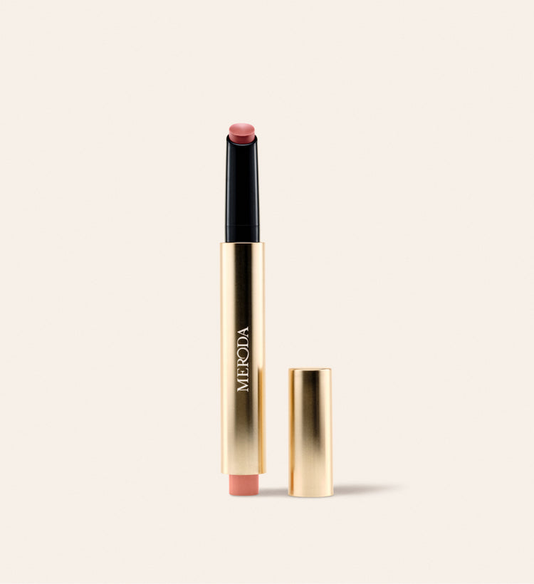 Hydrating Lip Tint in Dusty Rose, featuring a gold applicator pen and a soft mauve-pink satin finish.