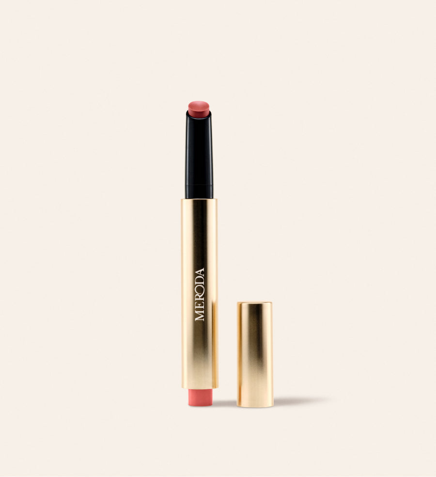Hydrating Lip Tint in Peachy Rose in sleek gold packaging, providing a fresh wash of sheer, buildable satin colour.