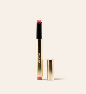 Hydrating Lip Tint in Peachy Rose in sleek gold packaging, providing a fresh wash of sheer, buildable satin colour.