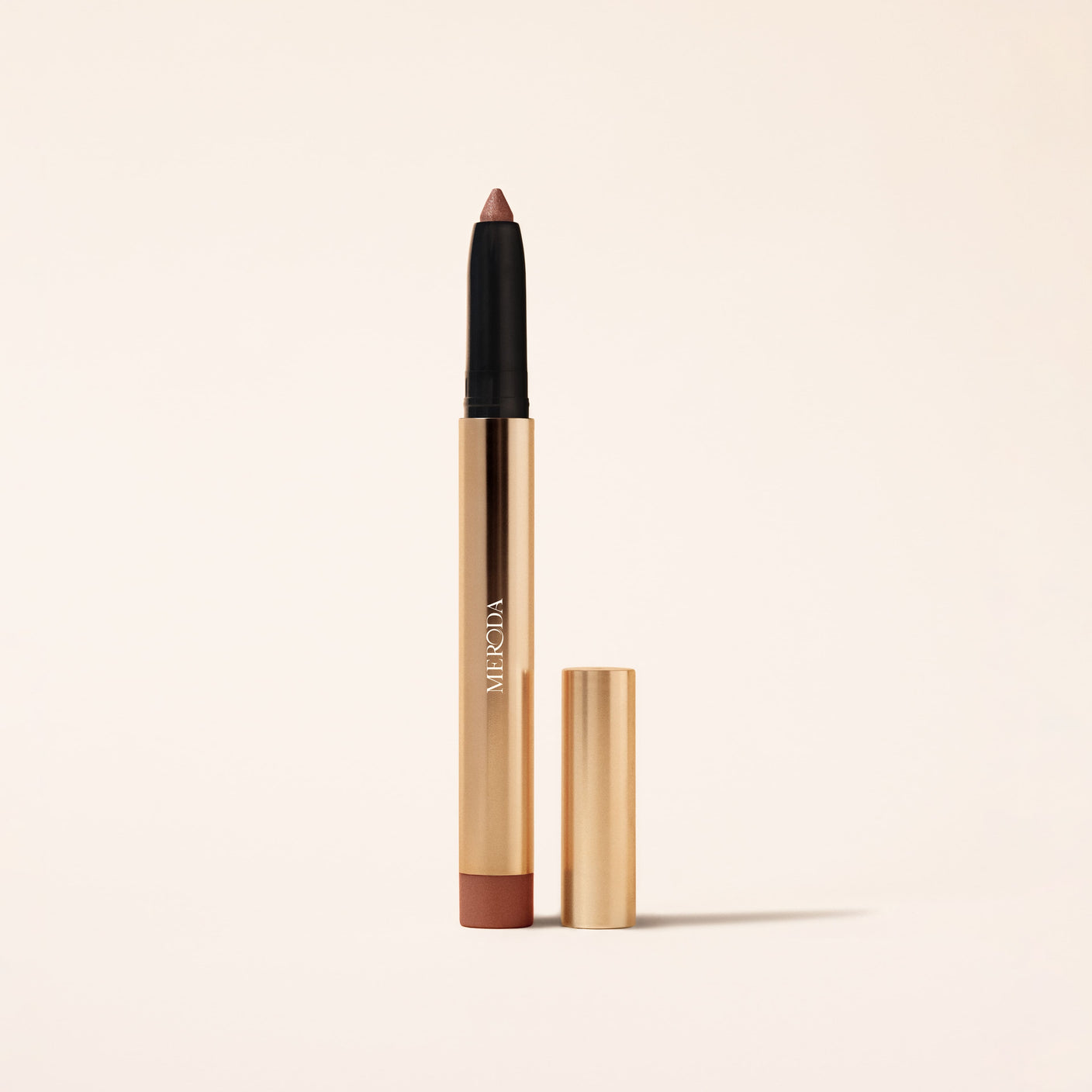 Meroda Cosmetics Eye Perfecting Shimmer Stick in Mauve with gold packaging