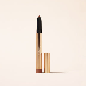 Meroda Cosmetics Eye Perfecting Shimmer Stick in Mauve with gold packaging