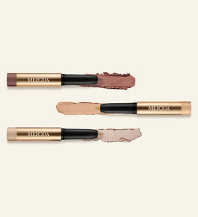 Mini Eye Shimmer Set featuring three shades with texture swatches