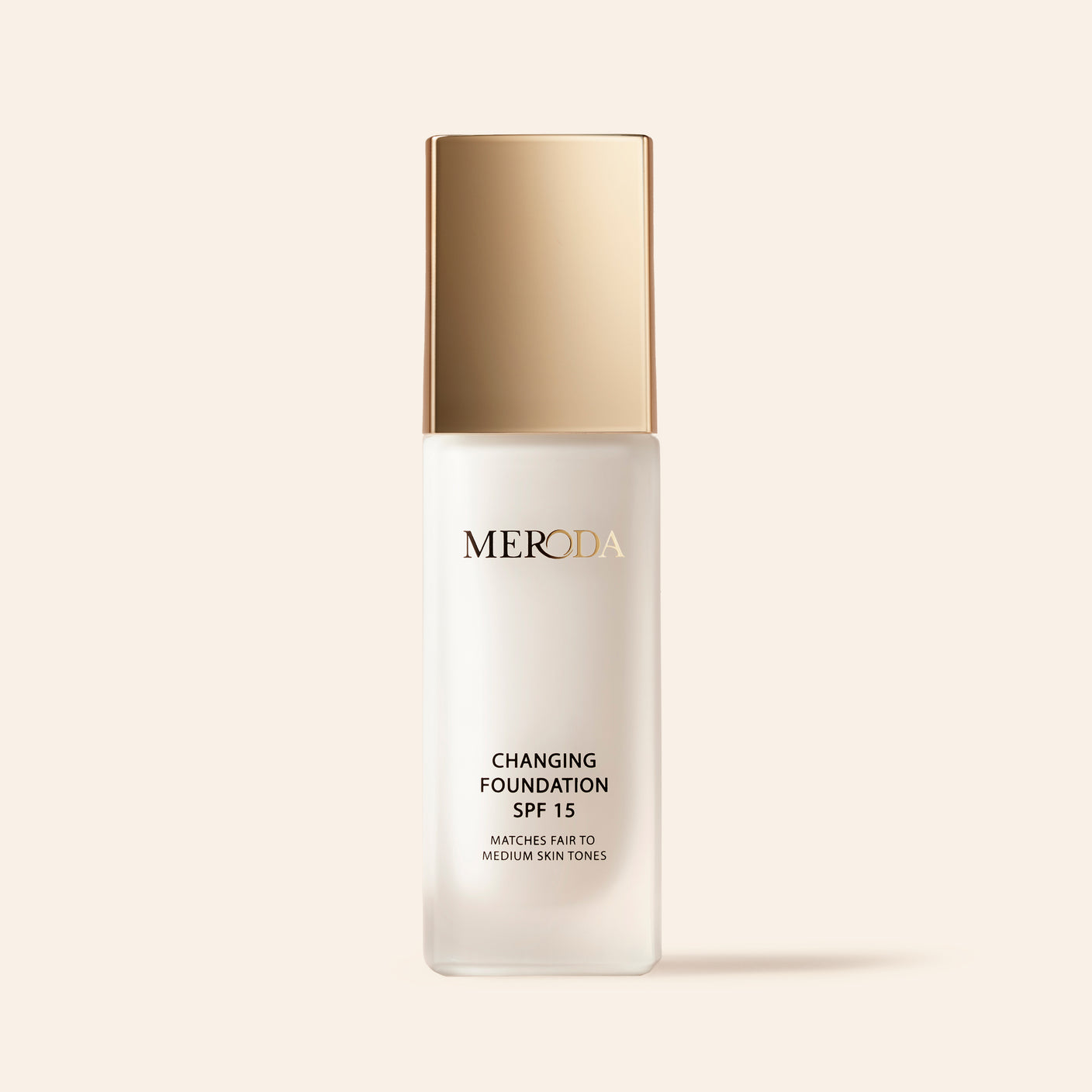 A pump bottle of MERODA Changing Foundation SPF 15, which is buildable and adapts to skin color, concealing redness and imperfections.