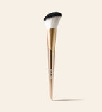 Vibrant Cheeks Blush Brush featuring angled synthetic bristles and a gold handle for a seamless finish