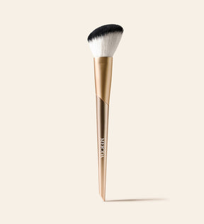 Vibrant Cheeks Blush Brush featuring angled synthetic bristles and a gold handle for a seamless finish
