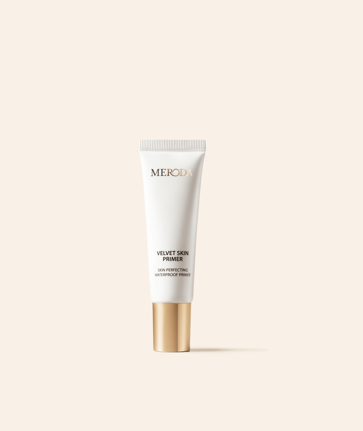 Velvet Skin Primer in a white tube with a gold cap, a smoothing waterproof base for a flawless complexion.
