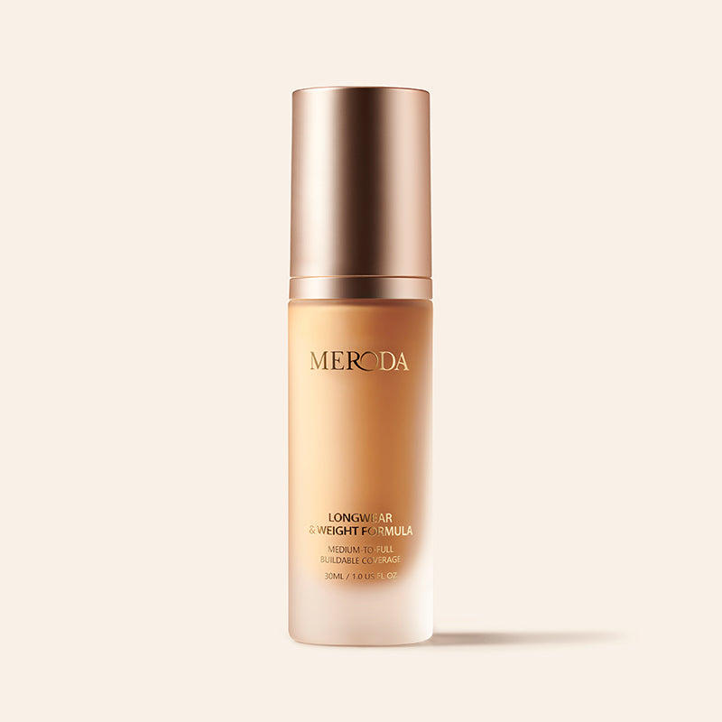 Universal Foundation bottle with a rose gold cap, featuring buildable medium-to-full coverage and a natural matte finish.