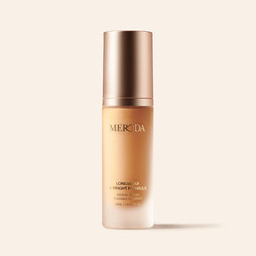 Universal Foundation bottle with a rose gold cap, featuring buildable medium-to-full coverage and a natural matte finish.