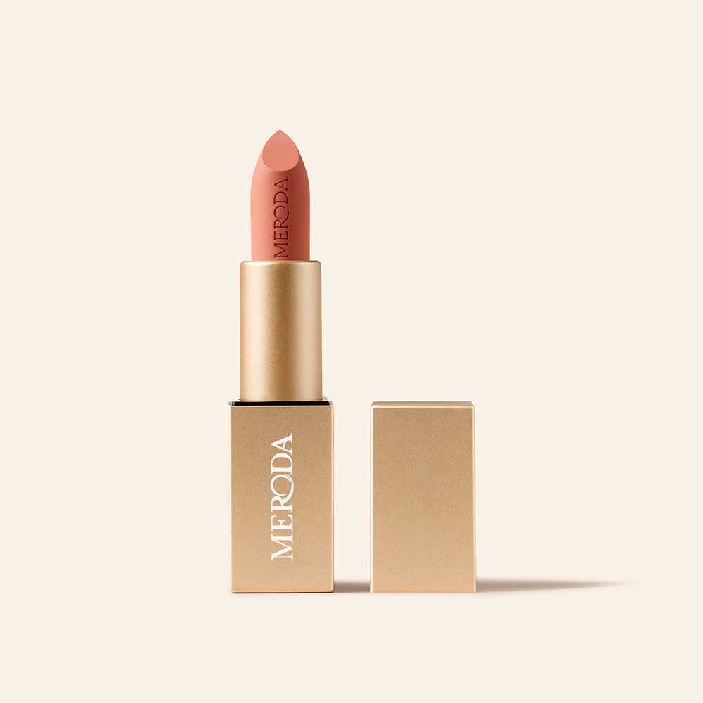 Meroda Cosmetics Velvet Dream Lipstick in Perfect Nude showing the open gold packaging and matte finish