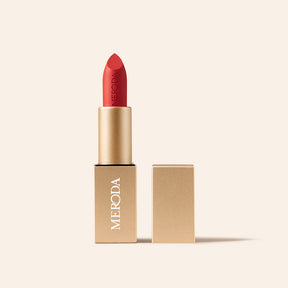 Meroda Cosmetics Velvet Dream Lipstick in Luscious Red showing the open gold tube