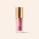 Vibrant Cheeks Liquid Blush in Grape Galore, a dewy purple blush in a frosted bottle with a gold cap.
