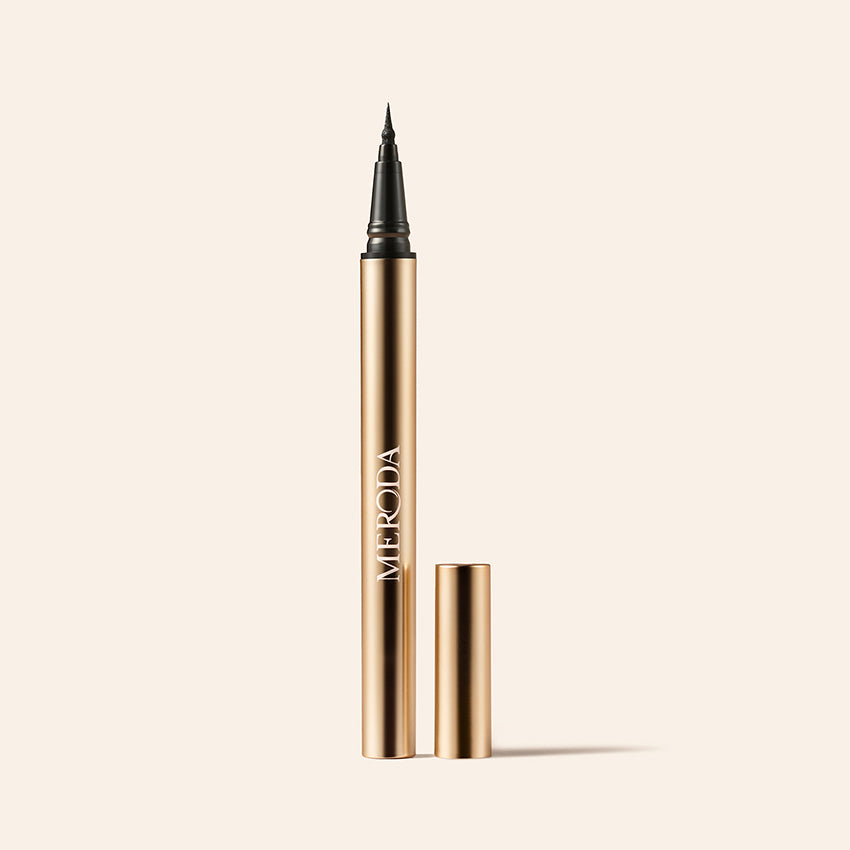 It's All About The Wing Liquid Waterproof Eyeliner gold metallic pen with a fine precision tip.