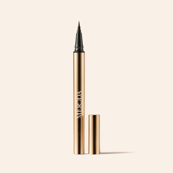 It's All About The Wing Liquid Waterproof Eyeliner gold metallic pen with a fine precision tip.