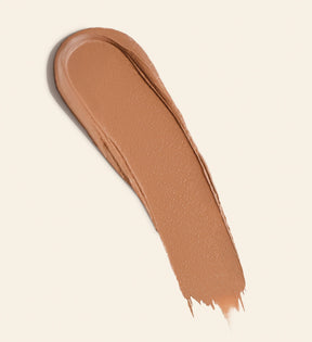 Soft Tan Bronzer creamy swatch in shade Light showcasing the buildable formula for a natural glow.