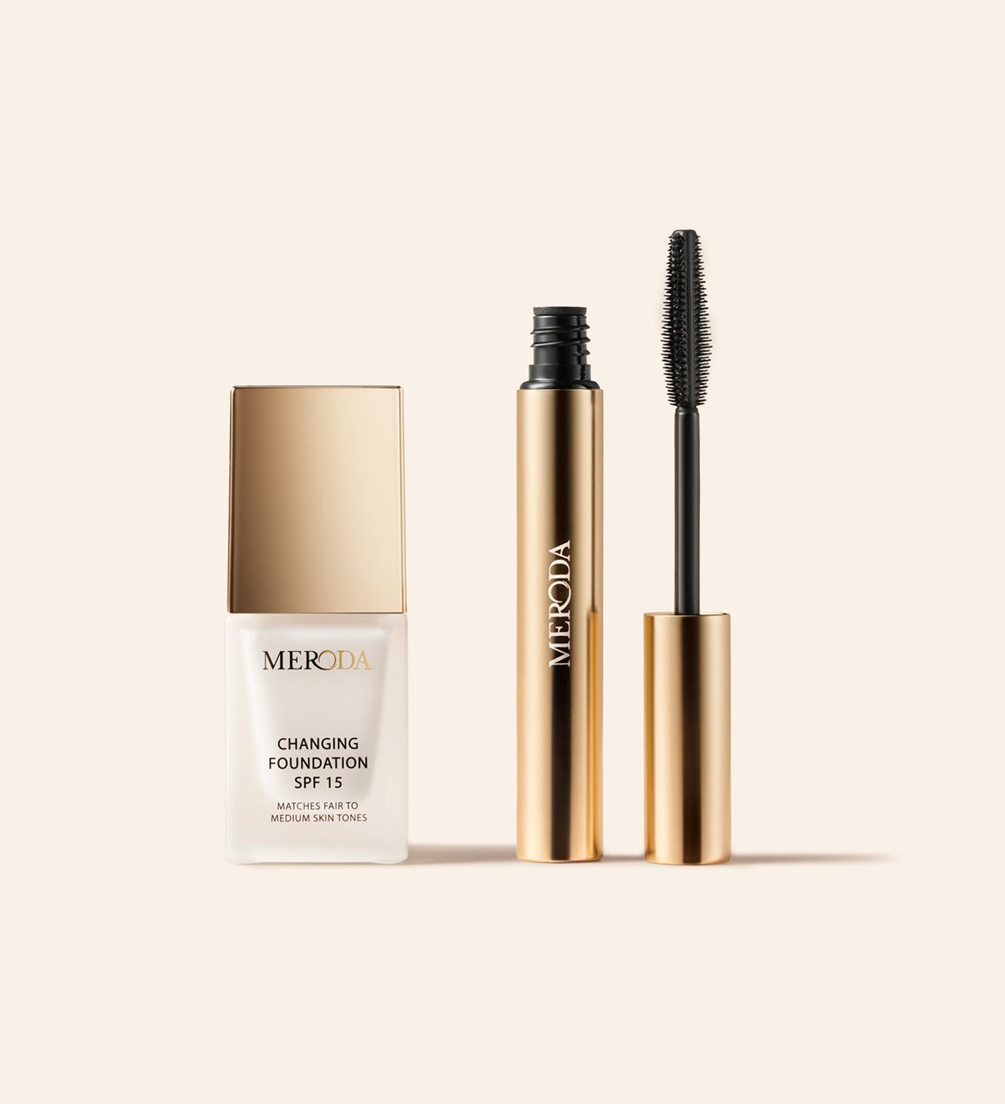 The Key Essentials Mini featuring Changing Foundation and Gilded Lashes Mascara in gold and white packaging.