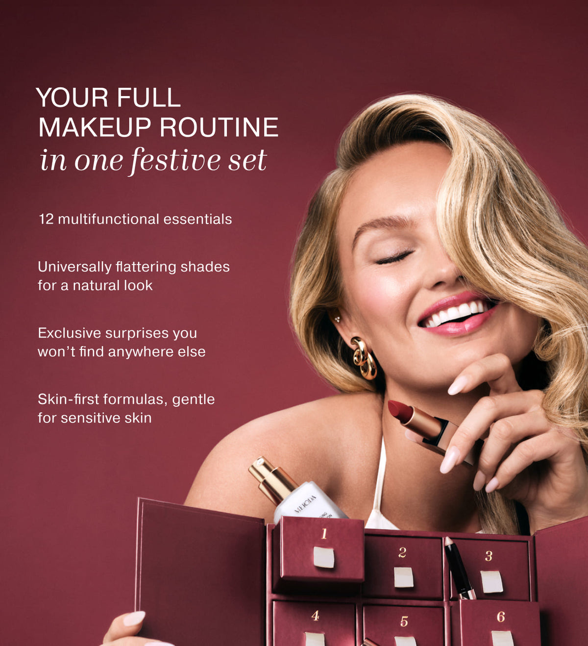 Smiling model holding a Meroda lipstick and opening the Advent Calendar filled with 12 beauty essentials.