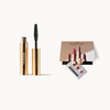 Makeup products including a mascara tube, lip gloss, and lipsticks on a white background